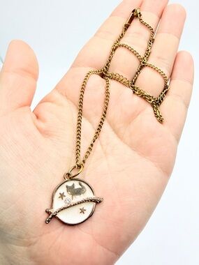 Gold Tone Planet & Star Pendant Necklace with Crystal Accent